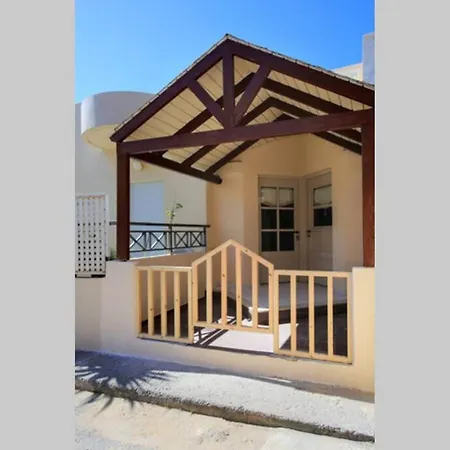 Flokos. Lazy Days, Balmy Nights On The Seafront Apartment
