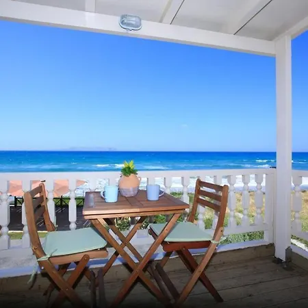 Flokos. Lazy Days, Balmy Nights On The Seafront Apartment