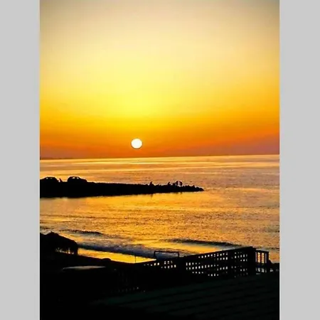 Flokos. Lazy Days, Balmy Nights On The Seafront *